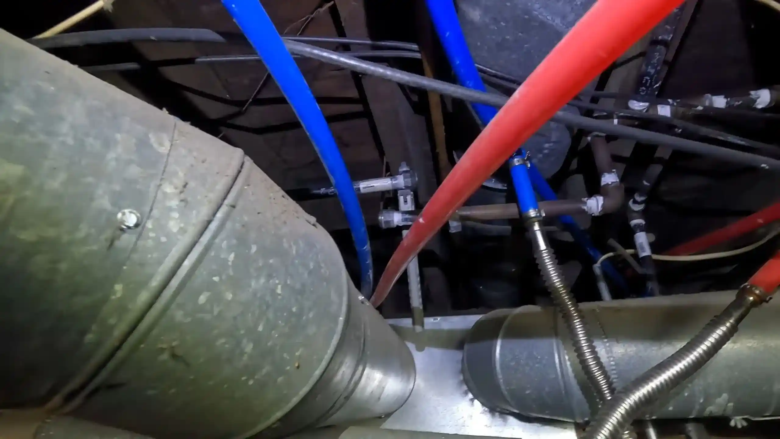 Gas line pressure test in a Chicago crawlspace near ductwork