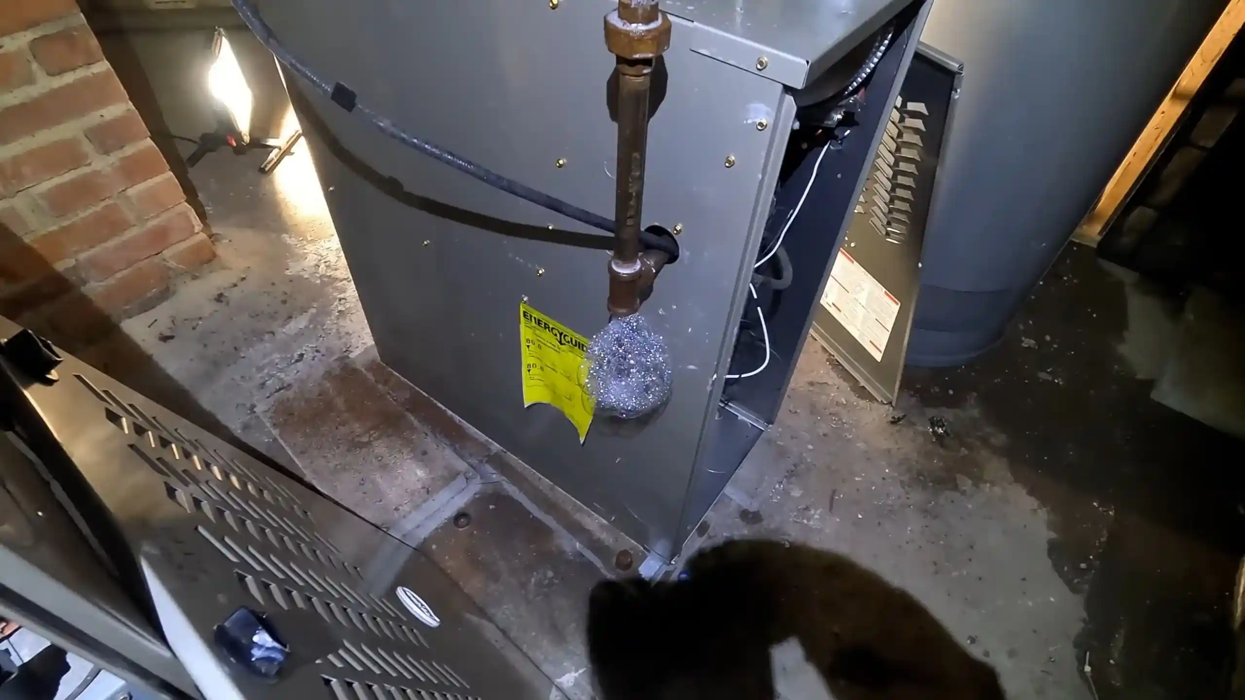 Gas line pressure test at a water heater valve in Chicago