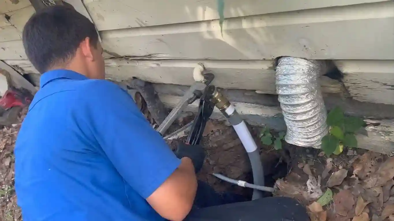 Gas pipe connection sleeved at a Chicago home foundation